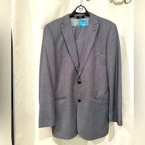 Men’s warehouse gray suit. Coat size 40L, pants size 34W L.